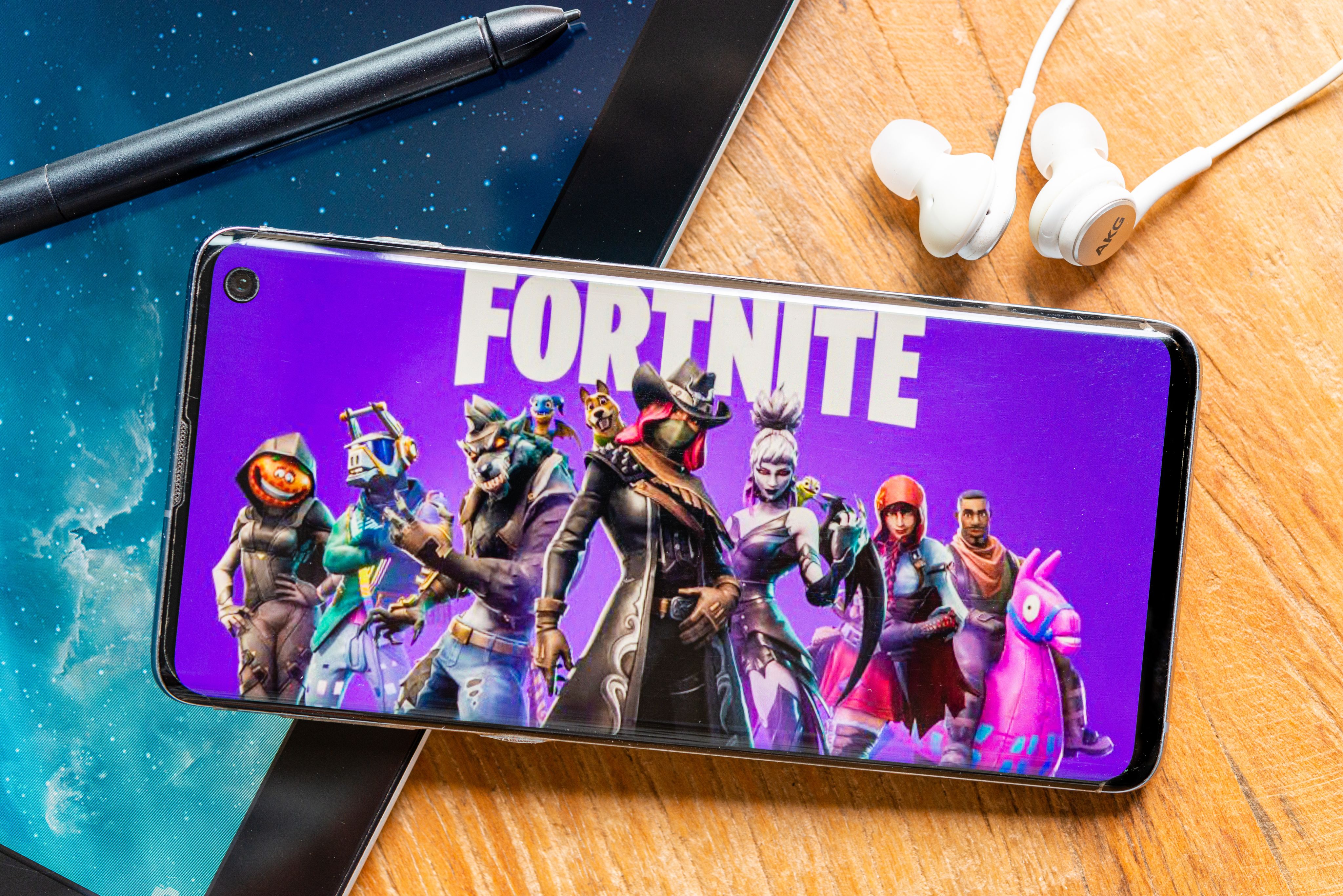 person holding white android smartphone