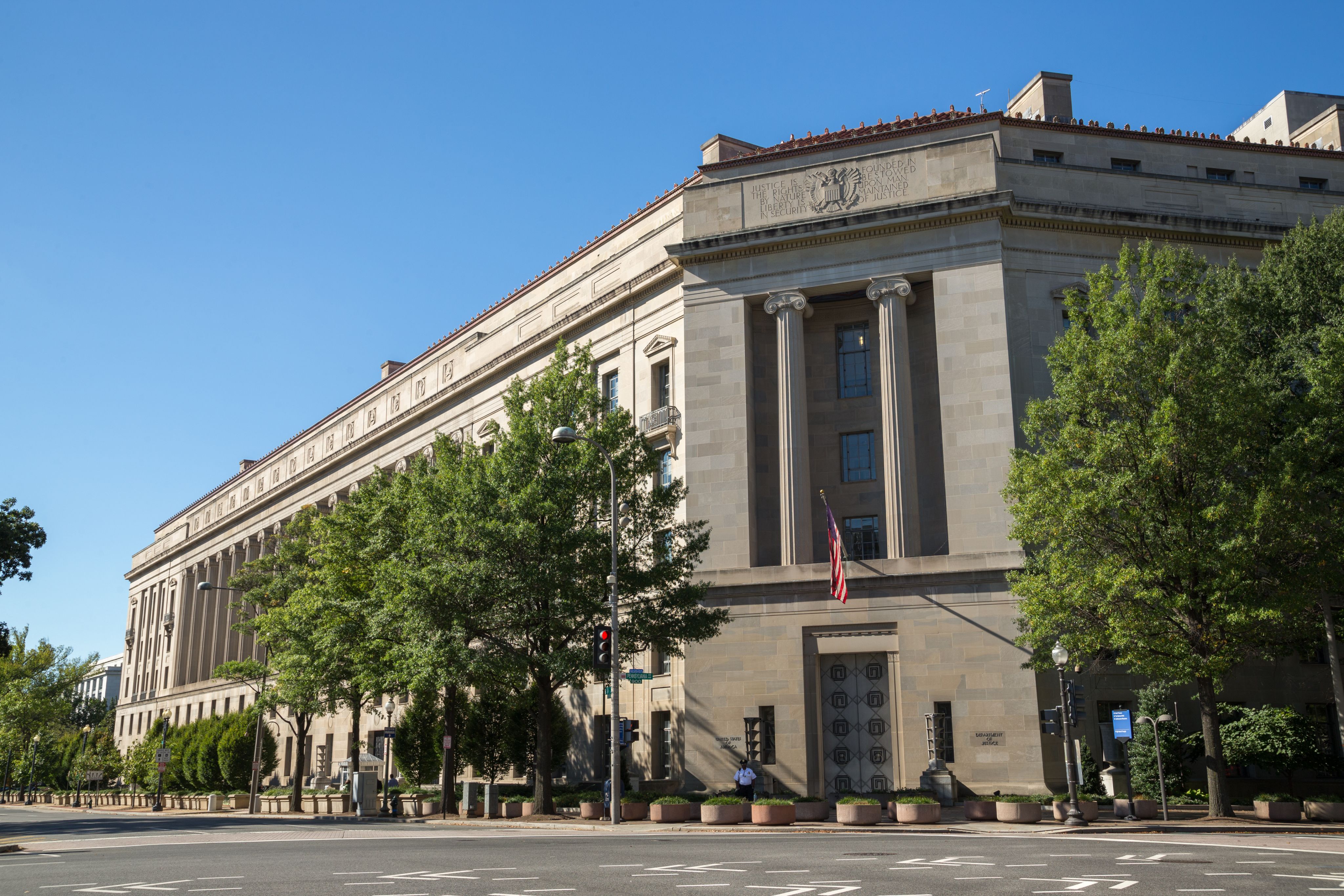 low angle photography of beige building