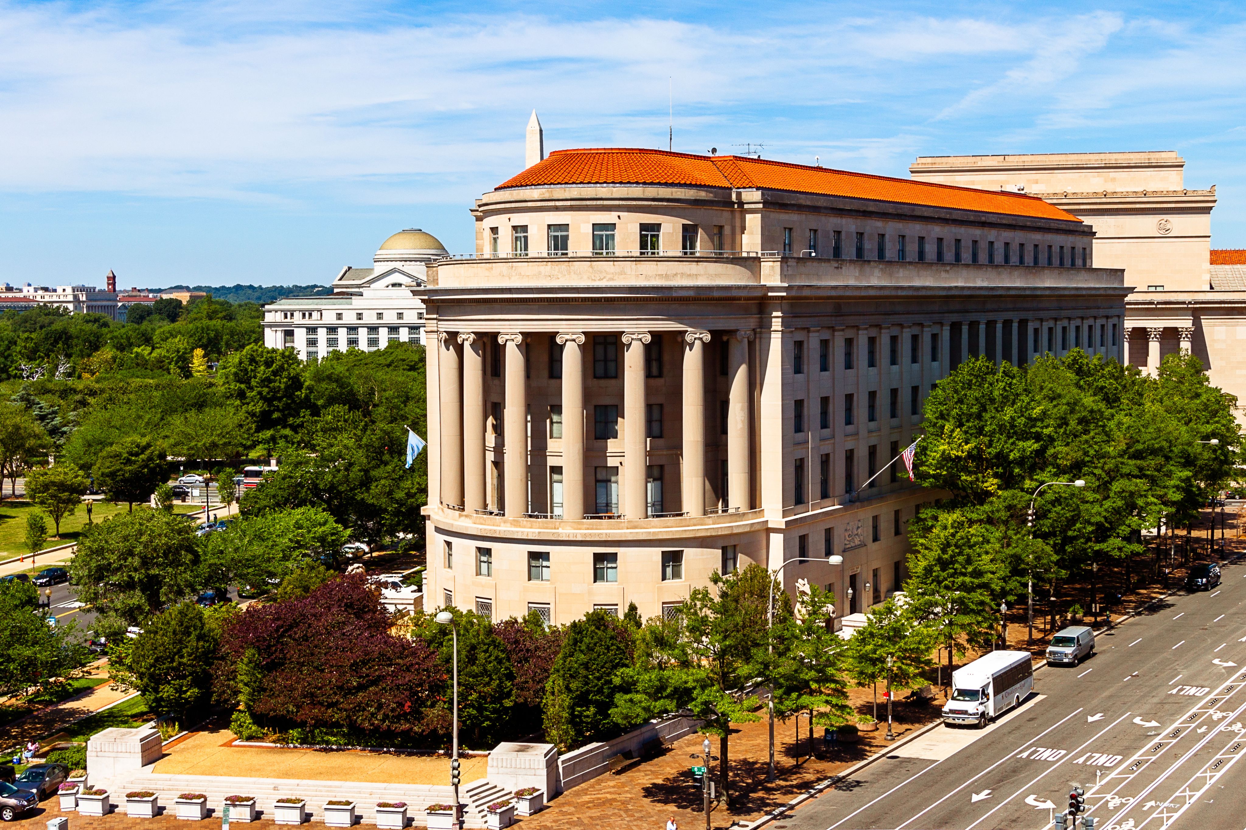 gray and brown concrete high-rise building