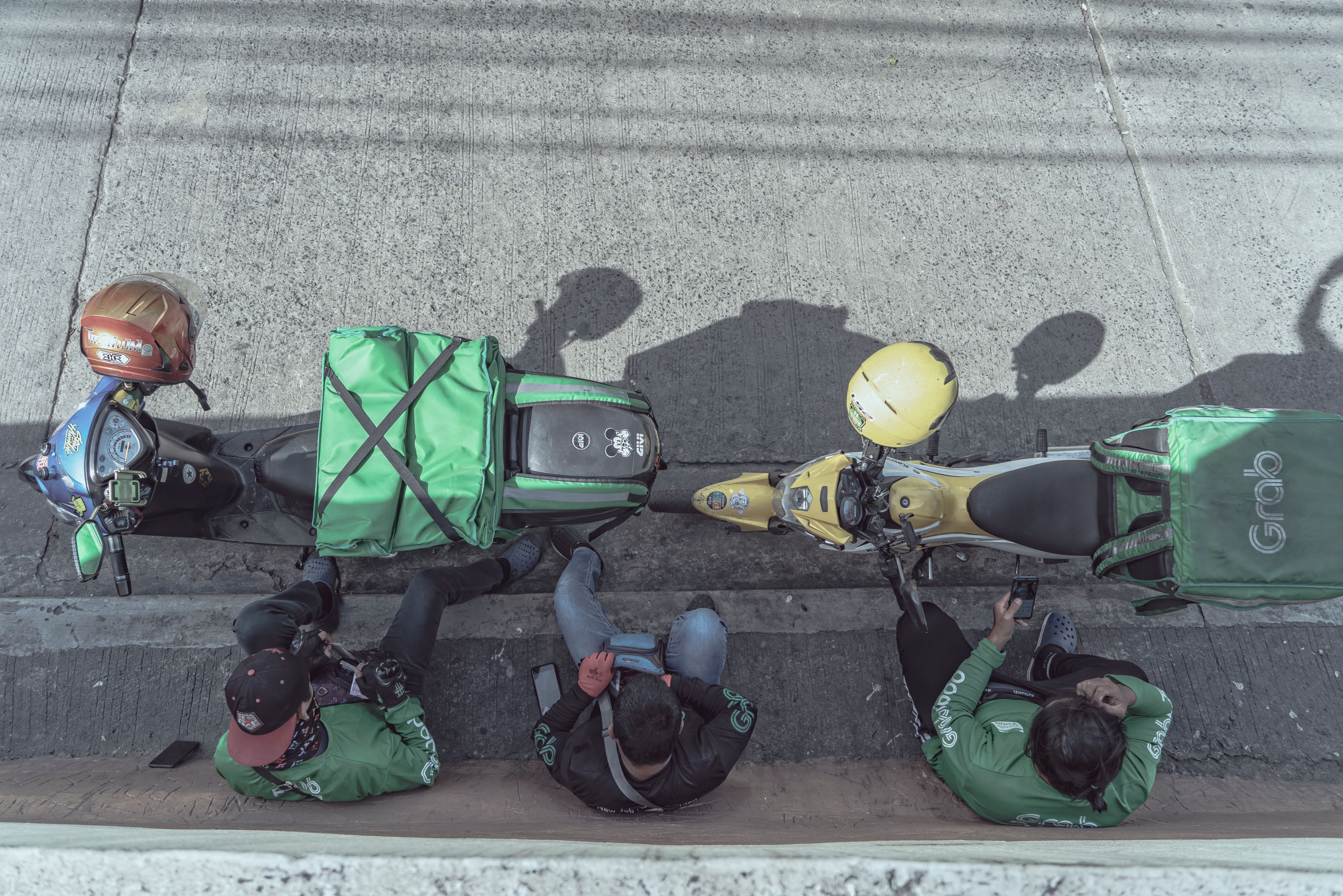 green and yellow motorcycle on road